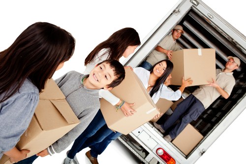 Local removals team handling furniture and boxes in Highbury