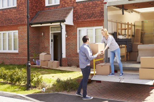 Furniture pick-up service for a Highbury home with bulky items ready for removal