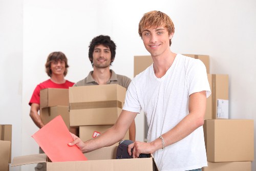 Loading boxes and furniture for a Highbury removals service